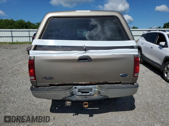 2002 Ford F-150 XL с VIN 1FTRX18L52NB25220, выставлен на аукционе Copart как лот 58202165 с пробегом 298 885 миль миль и Списание • Salvage title. История ставок и продаж доступна на DreamBid. Изображение 6.