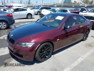 2007 BMW 3 Series 328i with VIN WBAWV13557P118052, listed as a IAAI auction lot 42642784 with 57,288 mi miles and . Bid and sale history available at DreamBid. Image 2.