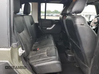 2015 Jeep Wrangler Unlimited Rubicon Hard Rock z VIN 1C4HJWFG8FL681796, wystawiony jako Copart lot #56391915 z przebiegiem 74 529 mil mil oraz Szkoda całkowita • Salvage title. Historia ofert i sprzedaży dostępna na DreamBid. Obrazek 10.