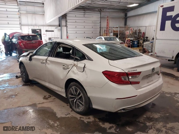 2021 Honda Accord Hybrid with VIN 1HGCV3F17MA022692, listed as a IAAI auction lot 41318681 with 76,467 mi miles. Bid and sale history available at carsss.com. Image 3.