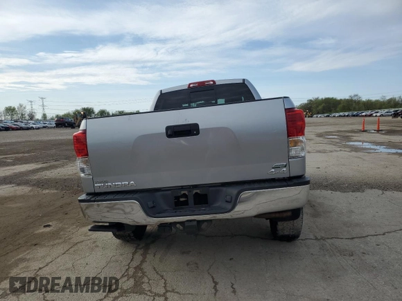 2010 Toyota Tundra с VIN 5TFUW5F14AX124598, выставлен на аукционе Copart как лот 54363625 с пробегом 149 268 миль миль и Списание • Salvage title. История ставок и продаж доступна на DreamBid. Изображение 6.