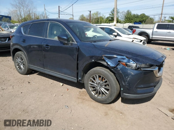 2017 Mazda CX-5 Touring with VIN JM3KFBCL4H0214579, listed as a Copart auction lot 54256775 with 95,541 mi miles and Clean Title. Bid and sale history available at carsss.com. Image 4.