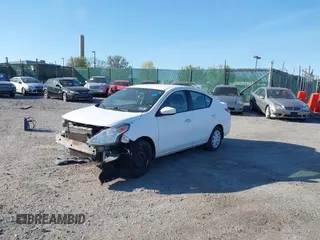 2015 Nissan Versa SV with VIN 3N1CN7AP0FL955480, listed as a IAAI auction lot 42070703 with 69,318 mi miles. Bid and sale history available at carsss.com. Image 2.