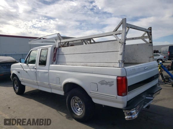 1992 Ford F-150 with VIN 1FTEX14N3NKB14423, listed as a Copart auction lot 77404624 with 287,507 mi miles and Salvage Title. Bid and sale history available at carsss.com. Image 2.