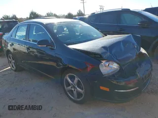 2009 Volkswagen Jetta SE z VIN 3VWRM71K69M061350, wystawiony jako IAAI lot #41818238 z przebiegiem 184 197 mil mil oraz . Historia ofert i sprzedaży dostępna na DreamBid. Obrazek 1.