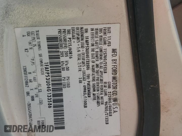 2004 Ford Taurus SE with VIN 1FAFP53U04G133586, listed as a Copart auction lot 59972925 with 228,938 mi miles and Salvage title. Bid and sale history available at DreamBid. Image 12.