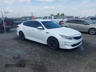 2016 Kia Optima LX z VIN 5XXGT4L36GG001570, wystawiony jako IAAI lot #42073428 z przebiegiem 194 927 mil mil oraz . Historia ofert i sprzedaży dostępna na DreamBid. Obrazek 1.