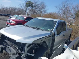 2016 Ford F-150 XLT with VIN 1FTFX1EFXGFA83792, listed as a IAAI auction lot 41034017 with 166,995 mi miles. Bid and sale history available at carsss.com. Image 15.