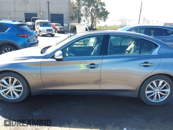 2014 Infiniti Q50 with VIN JN1BV7AP0EM682444, listed as a IAAI auction lot 41857312 with 140,765 mi miles. Bid and sale history available at carsss.com. Image 14.