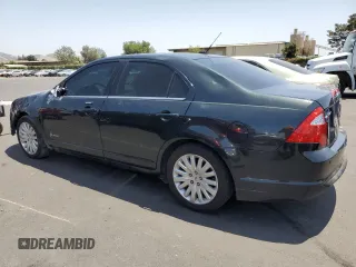 2010 Ford Fusion Hybrid z VIN 3FADP0L33AR185719, wystawiony jako Copart lot #59821115 z przebiegiem 154 019 mil mil oraz Czysty tytuł • Clean title. Historia ofert i sprzedaży dostępna na DreamBid. Obrazek 2.