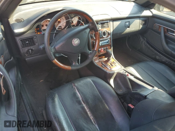 2001 Mercedes-Benz SLK-Class with VIN WDBKK65F71F175734, listed as a Copart auction lot 61874984 with 185,408 mi miles and Salvage Title. Bid and sale history available at carsss.com. Image 8.