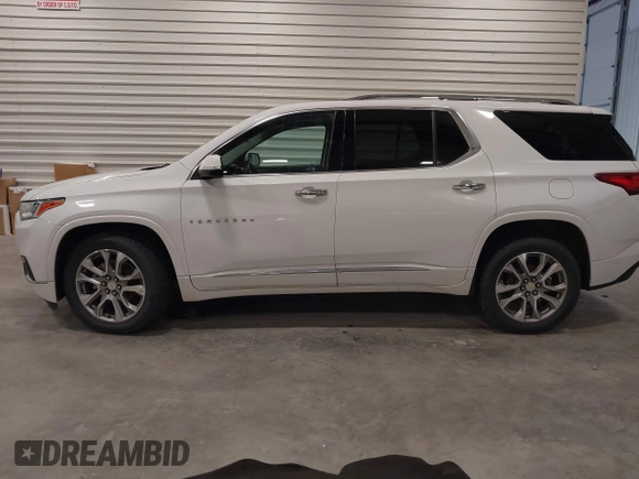 2021 Chevrolet Traverse Premier with VIN 1GNEVKKW7MJ218772, listed as a IAAI auction lot 42306743 with 106,898 mi miles and . Bid and sale history available at DreamBid. Image 14.