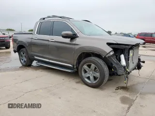 2022 Honda Ridgeline RTL-E с VIN 5FPYK3F75NB000675, выставлен на аукционе Copart как лот 58730835 с пробегом 32 161 миль миль и Списание • Salvage title. История ставок и продаж доступна на DreamBid. Изображение 4.