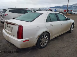 2005 Cadillac STS z VIN 1G6DC67A250231552, wystawiony jako IAAI lot #41765312 z przebiegiem 201 611 mil mil oraz . Historia ofert i sprzedaży dostępna na DreamBid. Obrazek 4.