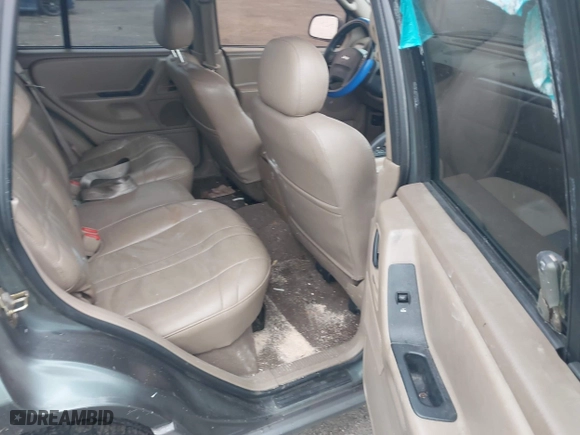 2002 Jeep Grand Cherokee Laredo with VIN 1J4GW48NX2C151430, listed as a IAAI auction lot 41886769 with 222,795 mi miles. Bid and sale history available at carsss.com. Image 8.