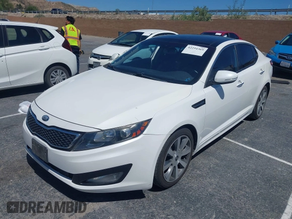 2013 Kia Optima SX with VIN 5XXGR4A65DG168350, listed as a IAAI auction lot 42254369 with 112,496 mi miles and . Bid and sale history available at DreamBid. Image 2.