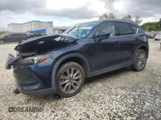 2021 Mazda CX-5 Grand Touring Reserve with VIN JM3KFBAY0M0414464, listed as a Copart auction lot 45245935 with 24,549 mi miles and Non Repairable. Bid and sale history available at carsss.com. Image 1.