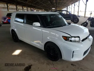 2012 Scion xB with VIN JTLZE4FE2CJ028761, listed as a Copart auction lot 53379165 with 131,758 mi miles and Salvage Title. Bid and sale history available at DreamBid. Image 4.