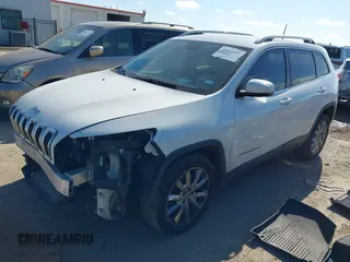 2016 Jeep Cherokee Limited with VIN 1C4PJLDB8GW256788, listed as a IAAI auction lot 41657339 with 104,630 mi miles. Bid and sale history available at carsss.com. Image 17.