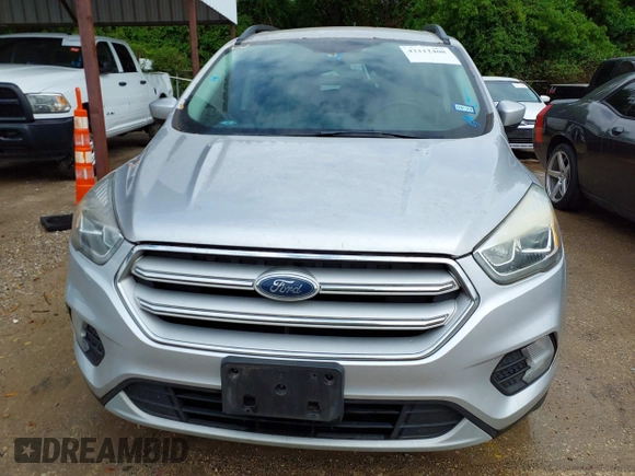 2018 Ford Escape SEL with VIN 1FMCU9HD6JUB24230, listed as a IAAI auction lot 42112408 with 104,447 mi miles. Bid and sale history available at carsss.com. Image 6.