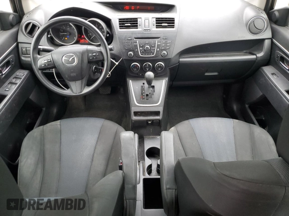 2015 Mazda 5 Sport with VIN JM1CW2BLXF0184094, listed as a Copart auction lot 56618405 with 98,757 mi miles and Salvage title. Bid and sale history available at DreamBid. Image 8.
