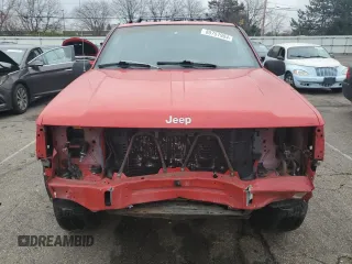 1996 Jeep Grand Cherokee Laredo with VIN 1J4GZ58S7TC292217, listed as a Copart auction lot 80757904 with 156,041 mi miles and Salvage Title. Bid and sale history available at carsss.com. Image 5.