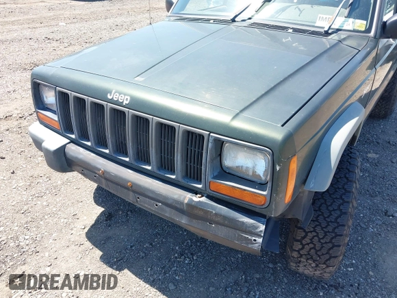 1998 Jeep Cherokee Sport with VIN 1J4FJ68S9WL189992, listed as a IAAI auction lot 42039822 with 156,006 mi miles. Bid and sale history available at carsss.com. Image 6.