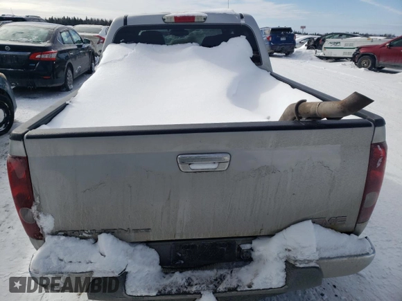 2011 GMC Canyon SLT with VIN 1GTH6NFE2B8117617, listed as a Copart auction lot 43222695 with 146,277 mi miles and Salvage Title. Bid and sale history available at carsss.com. Image 6.