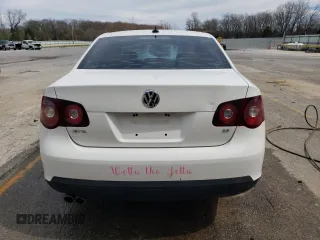 2009 Volkswagen Jetta SE with VIN 3VWRM71K29M038941, listed as a Copart auction lot 49894255 with 193,057 mi miles and Salvage title. Bid and sale history available at DreamBid. Image 6.