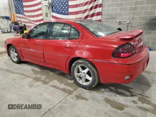 1999 Pontiac Grand Am GT1 with VIN 1G2NW52E7XM848894, listed as a Copart auction lot 43809495 with 117,059 mi miles and Salvage Title. Bid and sale history available at carsss.com. Image 2.