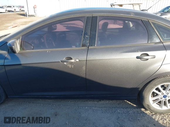 2018 Ford Focus SE with VIN 1FADP3F20JL216525, listed as a IAAI auction lot 41744383 with 92,385 mi miles. Bid and sale history available at carsss.com. Image 14.