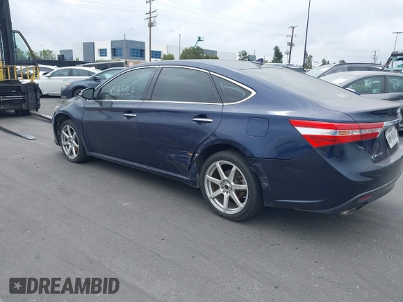 2013 Toyota Avalon XLE with VIN 4T1BK1EBXDU028403, listed as a IAAI auction lot 41545852 with 147,668 mi miles and . Bid and sale history available at DreamBid. Image 3.