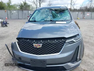 2020 Cadillac XT6 FWD Premium Luxury z VIN 1GYKPCRS9LZ129763, wystawiony jako IAAI lot #42052532 z przebiegiem 57 670 mil mil oraz . Historia ofert i sprzedaży dostępna na DreamBid. Obrazek 11.