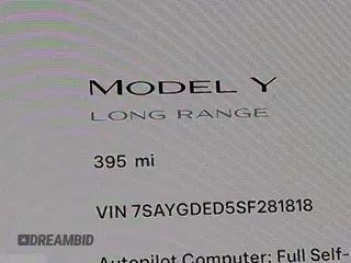 2025 Tesla Model Y Long Range with VIN 7SAYGDED5SF281818, listed as a IAAI auction lot 41302611 with 395 mi miles and . Bid and sale history available at DreamBid. Image 15.
