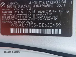 2011 BMW Z4 sDrive35is with VIN WBALM1C54BE633439, listed as a Copart auction lot 60327265 with 112,302 mi miles and Salvage title. Bid and sale history available at DreamBid. Image 12.