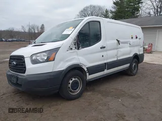 2016 Ford Transit Cargo with VIN 1FTYE1ZM9GKB06266, listed as a IAAI auction lot 41925586 with 165,779 mi miles and . Bid and sale history available at carsss.com. Image 2.