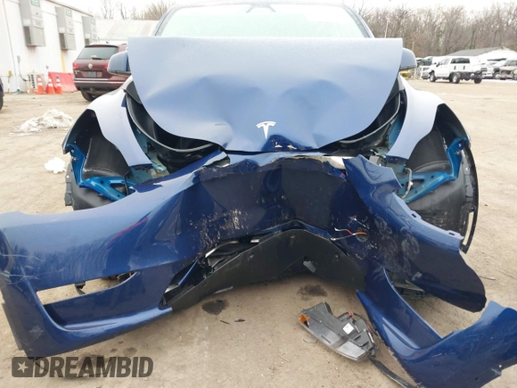 2025 Tesla Model Y Long Range with VIN 7SAYGDED9SF248370, listed as a IAAI auction lot 41336869 with 2,499 mi miles and . Bid and sale history available at DreamBid. Image 6.