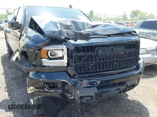 2015 GMC Sierra 2500HD Denali with VIN 1GT120E82FF574358, listed as a IAAI auction lot 42377676 with 86,097 mi miles and . Bid and sale history available at DreamBid. Image 6.