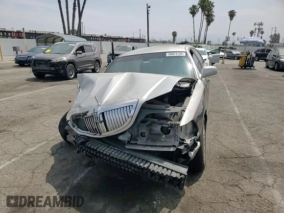 2003 Lincoln Town Car Executive z VIN 1LNHM81W33Y653643, wystawiony jako Copart lot #58824145 z przebiegiem Nie podano mil oraz Szkoda całkowita • Salvage title. Historia ofert i sprzedaży dostępna na DreamBid. Obrazek 14.