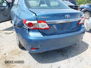 2013 Toyota Corolla L with VIN 5YFBU4EE5DP210100, listed as a IAAI auction lot 40178941 with 103,000 mi miles and . Bid and sale history available at DreamBid. Image 12.