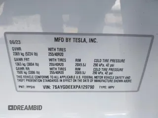 2023 Tesla Model Y Long Range with VIN 7SAYGDEEXPA129790, listed as a IAAI auction lot 41735721 with 20,402 mi miles and . Bid and sale history available at DreamBid. Image 9.