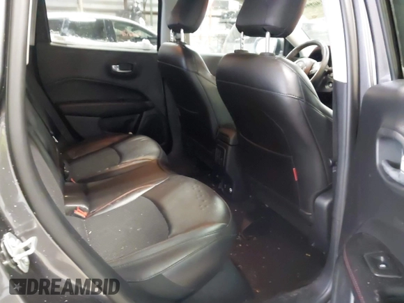 2019 Jeep Compass Trailhawk with VIN 3C4NJDDB2KT649889, listed as a IAAI auction lot 41562599 with 70,700 mi miles and . Bid and sale history available at carsss.com. Image 8.