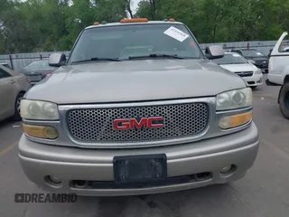 2004 GMC Sierra Denali z VIN 2GTFK69U741354475, wystawiony jako IAAI lot #42334568 z przebiegiem 305 379 mil mil oraz . Historia ofert i sprzedaży dostępna na DreamBid. Obrazek 11.