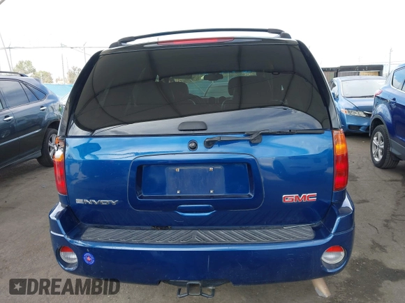 2006 GMC Envoy SLE with VIN 1GKDS13S562252049, listed as a IAAI auction lot 41940052 with 149,445 mi miles. Bid and sale history available at carsss.com. Image 17.