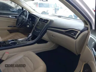 2013 Ford Fusion SE Hybrid z VIN 3FA6P0LU1DR310075, wystawiony jako IAAI lot #42085556 z przebiegiem Nie podano mil oraz . Historia ofert i sprzedaży dostępna na DreamBid. Obrazek 5.