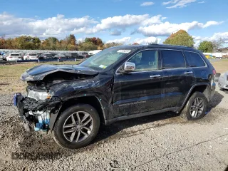 2017 Jeep Grand Cherokee Limited with VIN 1C4RJFBG3HC835019, listed as a Copart auction lot 74795804 with 104,999 mi miles and Salvage title. Bid and sale history available at DreamBid. Image 1.