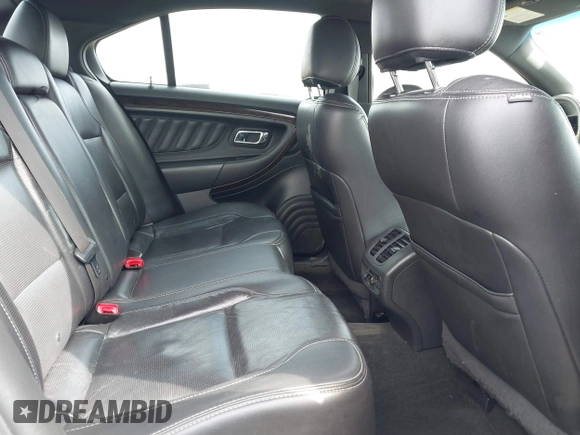 2016 Ford Taurus Limited with VIN 1FAHP2F8XGG130950, listed as a IAAI auction lot 41833038 with 128,536 mi miles and . Bid and sale history available at DreamBid. Image 8.
