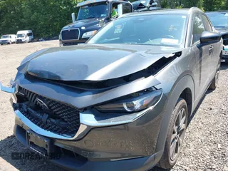2024 Mazda CX-30 S Select Sport with VIN 3MVDMBBM9RM641576, listed as a IAAI auction lot 42541454 with 40,271 mi miles and . Bid and sale history available at DreamBid. Image 12.