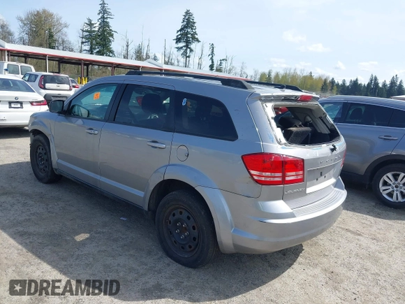 2016 Dodge Journey SE with VIN 3C4PDCAB2GT102871, listed as a IAAI auction lot 42009827 with 197,646 mi miles. Bid and sale history available at carsss.com. Image 3.