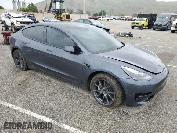 2023 Tesla Model 3 with VIN 5YJ3E1EA9PF543672, listed as a Copart auction lot 48211035 with Not Provided miles and Salvage Title. Bid and sale history available at DreamBid. Image 4.